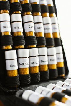  A case of small vials of homeopathic medicine used to treat illnesses.