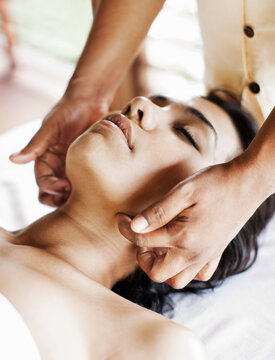 Woman Receiving Marma Point Therapy.  Koh Samui, Thailand.