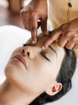 Woman Receiving Marma Point Therapy.  Koh Samui, Thailand.