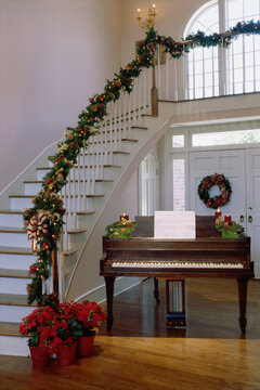 Christmas decorations on a staircase banister