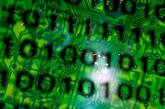 Binary code superimposed on a circuit board