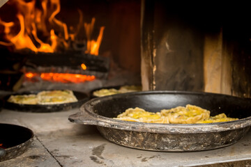 Hot flame in the oven. A Traditional Wood-Fired Meat Oven.