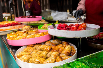 Plate with sweets. Table setting, food, holiday, birthday preparation. Oriental sweets, Turkish sweets