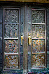 The Beautifully Carved Metal Doors Covered in Scenes from the Roman Catholic Faith at the Entrance of the Notre Dame Cathedral in Luxembourg City, Luxembourg