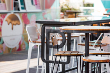 Street fast food. A fast food restaurant in the fresh air. Retro pink car as a table.