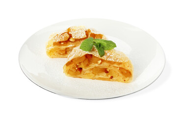 Pieces of delicious apple strudel with almonds, powdered sugar and mint on white background
