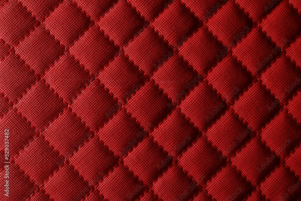 Sticker Texture of red leather as background, closeup