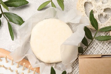 Flat lay composition with solid shampoo bars on light grey table - obrazy, fototapety, plakaty