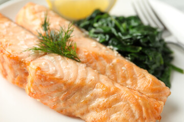 Closeup view of tasty salmon and spinach