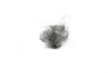 tangle of pet hair on a white background