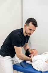 Obraz premium Physiotherapist Massaging Woman's Neck