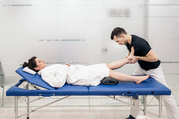 Fototapeta premium Man Working in Physiotherapy Clinic