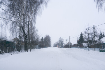 winter road in the village