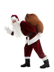 Santa Claus with sack walking on white background