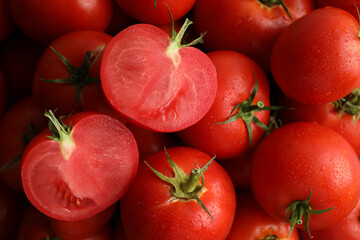 Fresh ripe red tomatoes as background, closeup