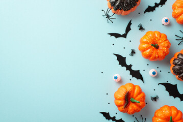 Halloween concept. Top view photo of small pumpkins bat silhouettes insects spiders centipede...