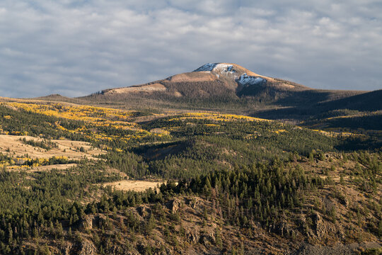 Early Fall snow with autumn colors on Del Norte Peak  in the Rio Grande National Forest.
Del Norte Peak is a prominent landmark  near South Fork Colorado.