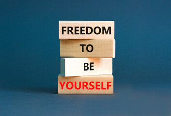 Freedom to be yourself symbol. Concept words Freedom to be yourself on wooden blocks on a beautiful grey table grey background. Business, psychological freedom to be yourself concept.