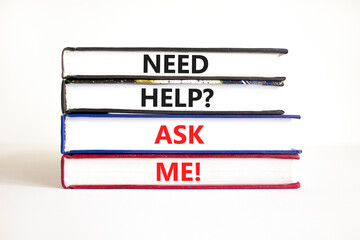 Support and need help ask me symbol. Concept words Need help ask me on books on a beautiful white table white background. Business, support and Need help ask me concept.