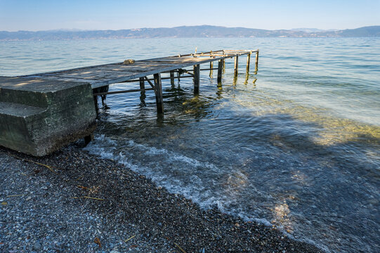 Stony shore of Ohrid lake in Summer, North Macedonia