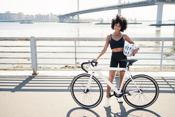 Fototapeta na wymiar Cyclist woman cycling fitness training, road bike in the city.