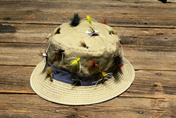 Fishing hat covered with fishing lures