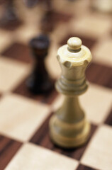 Close-up of chessmen on a chess board