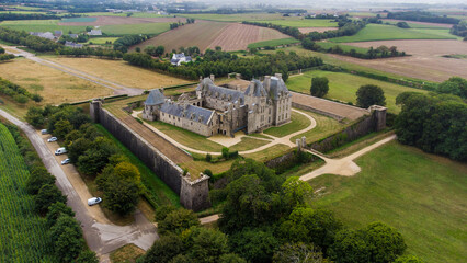 Aerial view of the Castle of Kerjean in Brittany, France - Fortified renaissance style manor house built for members of the Barbier family in the 16th century in Finistère - obrazy, fototapety, plakaty