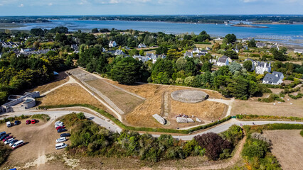 Aerial view of the Locmariaquer megalith site near Carnac in Brittany, France - Neolithic tumulus,...