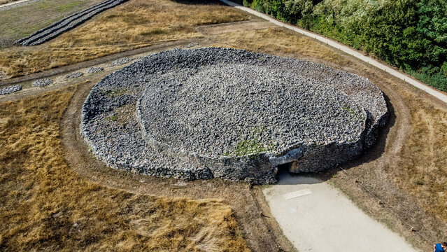 Aerial view of the Locmariaquer megalithic site near Carnac in Brittany, France - Dolmen and cairns of the "Table des Marchands" (Merchant's table) gallery grave in Morbihan