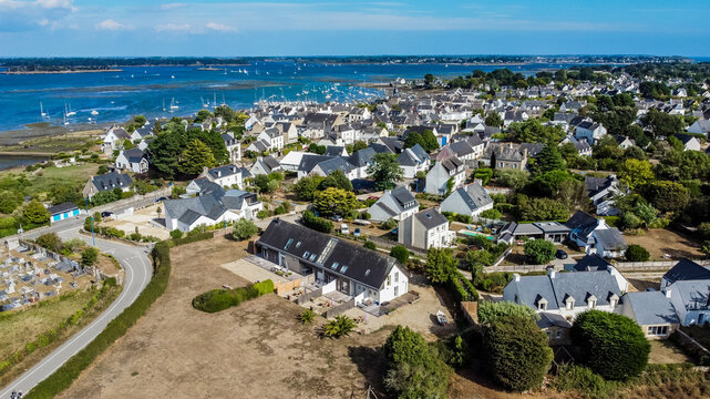 Aerial view of the seaside village of Locmariaquer near Carnac in Brittany, France - Residential neighborhood with secondary homes with a traditional architecture near the Atlantic Ocean