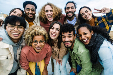 Young multiracial people having fun together outdoor - Big group portrait of happy young student...