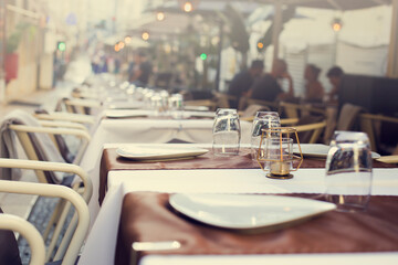 Atmothfere  city background with cafe table setting in old center Lisboa 
