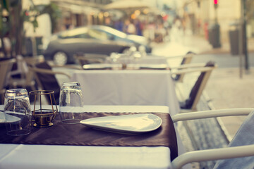 Atmothfere  city background with cafe table setting in old center Lisboa 