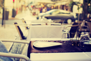 Atmothfere  city background with cafe table setting in old center Lisboa 