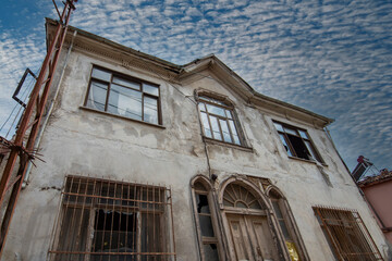 Fototapeta na wymiar Trilye streets, houses of seasdie town of Bursa with clouds and day light