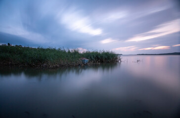 Long Exposure, Uluabat lake at sunset colors and clouds with a long exposure shot