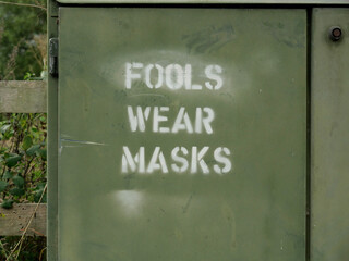 Fools Wear Masks graffiti on a fuse box
