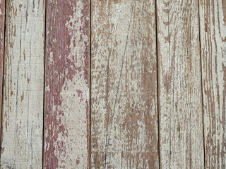 Boards with chipped paint. Old broken wooden boards. Background from boards. Abandoned place. Broken wooden items.