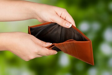 Leather wallet on the hand. Leather wallets and cardholders are popular among men.