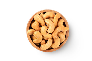 Bowl of cashew nuts on white background. Top view