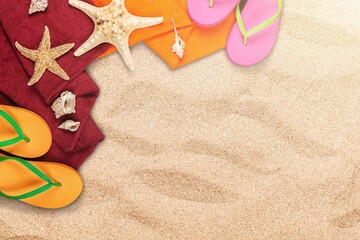 Fototapeta na wymiar Top view of towel on sandy beach. Holiday summer concept