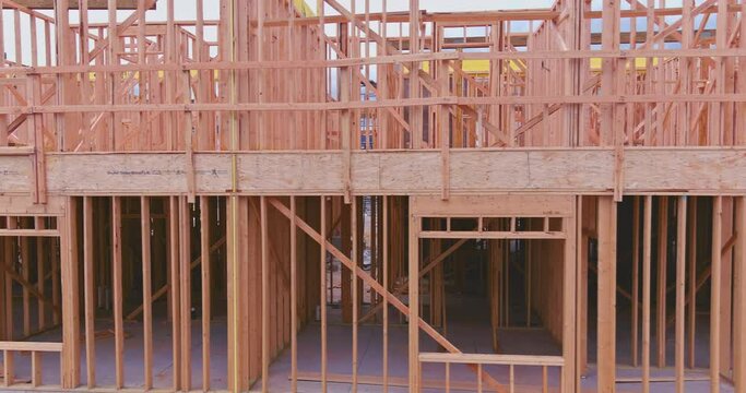 A new building wooden trusses is being framework house with timber frame stick beam is currently under construction