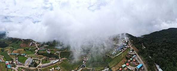 Aerial drone shot Landscape Panorama view, Clouds mist among mountain morning sunrise at Phu Thap Boek- Phetchabun Province.