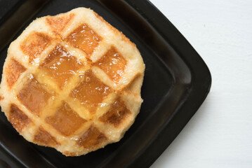 pineapple waffles ,belgian waffles top pineapple jam on white background, top view.