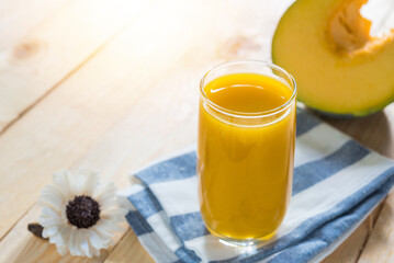 pumpkin juice on wooden, high beta-carotene.