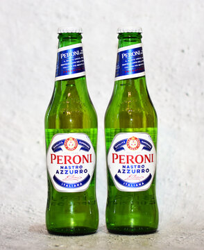 Two Peroni Beer Bottles