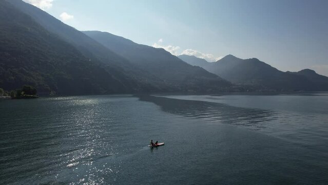 Aerial view of a person doing canoe in the Como Lake, Italy.