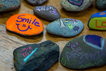 Positive messages written on rock. Kindness rocks!