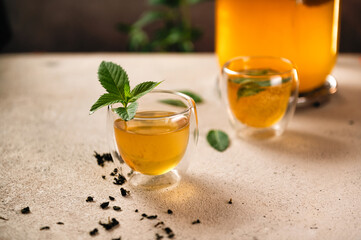 Tea mushroom, kombucha drink, home-made, refreshing drink in glass cups with mint